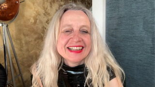 In a latex corset horny prolapse fisting with a mega dildo