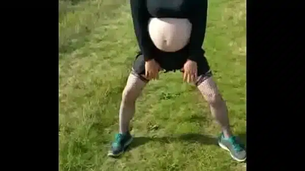 bisexual crossdresser out in public plays with his cock and shoots a load