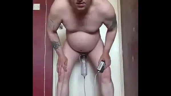 bisexual gay mark wright inserts electro nipple clamps on the end of his cock and takes a piss at the same time filling up his piss tube and covering all the electro wires